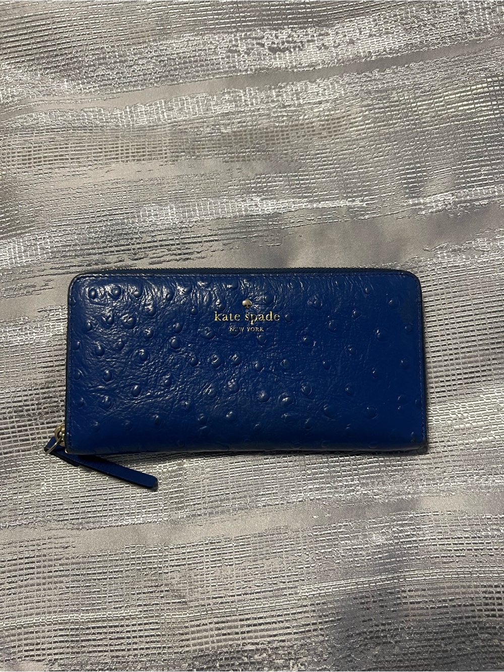 kate spade New York royal blue embossed zip-around wallet